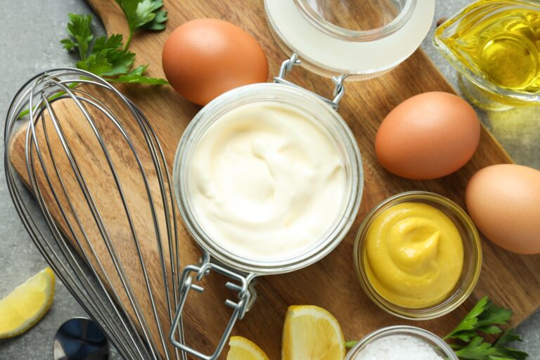 Concept of egg sauce, mayonnaise, top view
