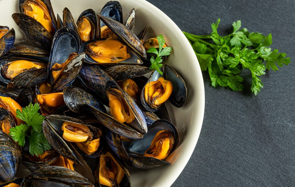 Fresh cooked mussels and parsley